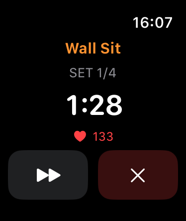 Wall Sit interval on a 42mm Apple Watch with live heart rate at 133 bpm